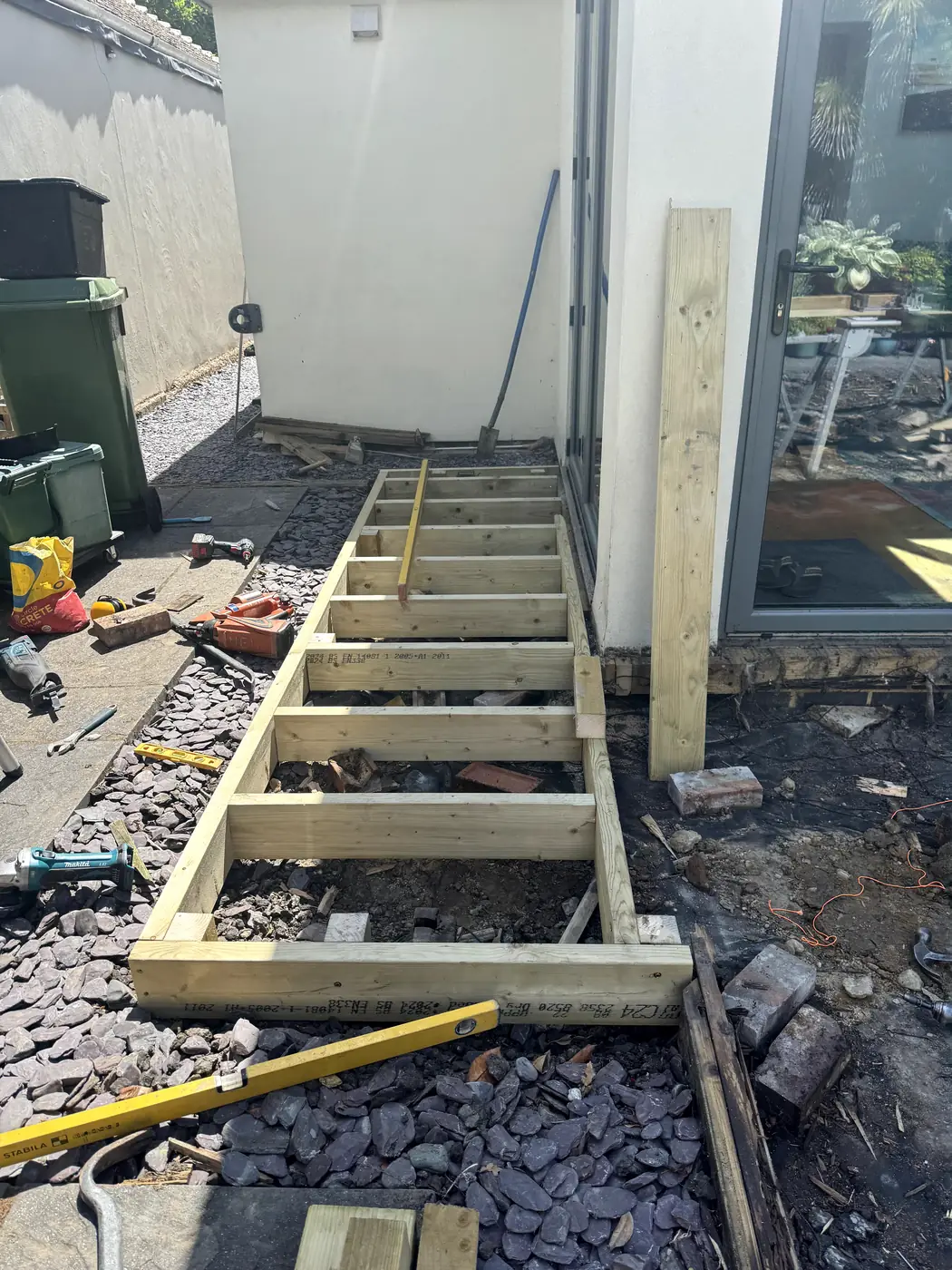 Deck sub-frame joists near patio doors, alternate angle