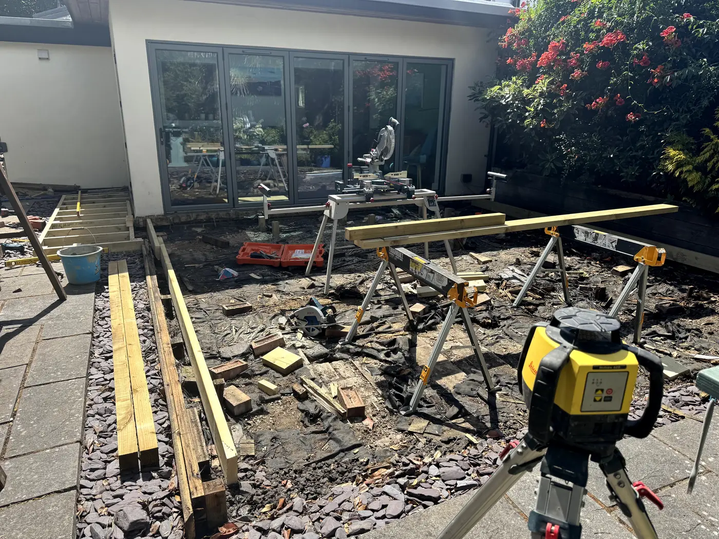 Decking frame being laid out with mitre saw station